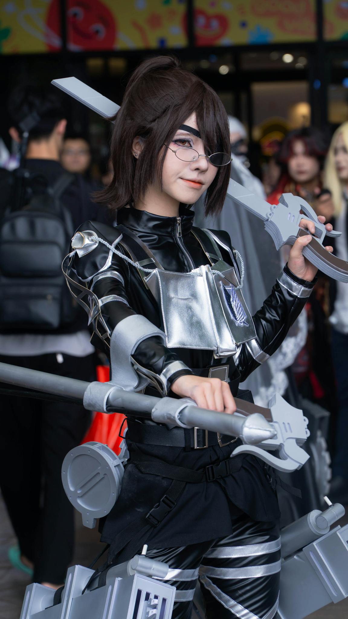 A talented cosplayer embodying an anime character at a bustling fan convention.